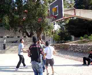 Ulrich Albrecht Playing Basketball with Children